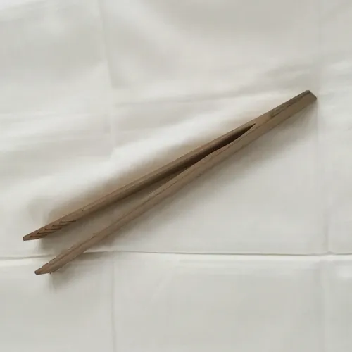 Plain wooden tongs 