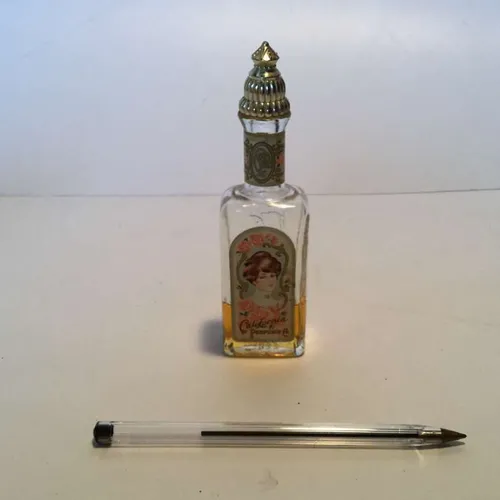 small period perfume bottle 'California' label with gold ornate top