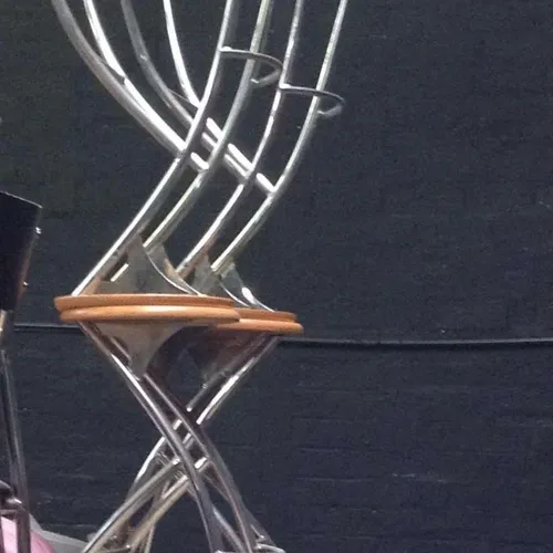 Chrome leg bar stools with circular wooden seat