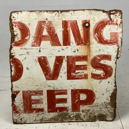 Aged wood white with Red text sign