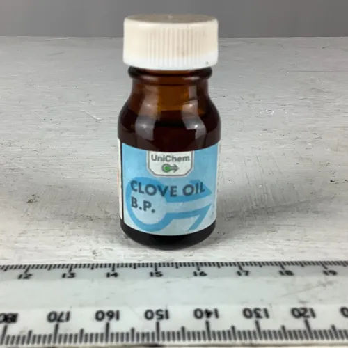 Small Brown Glass Clove Oil Bottle