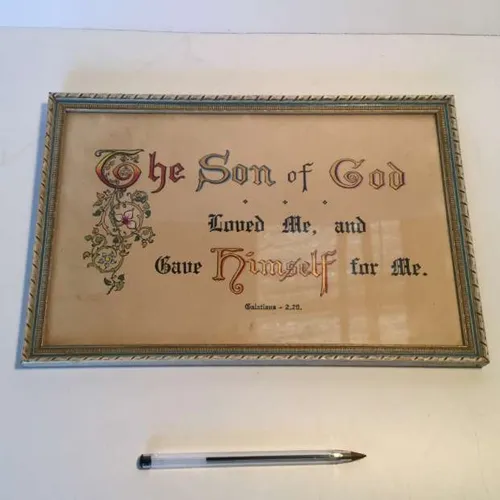 religious wall hanging 'The Son of God' text on cream background with wooden frame