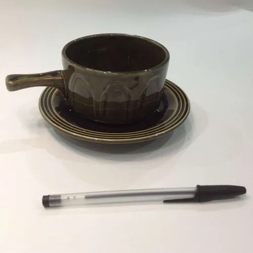 green ceramic soup bowl with plate