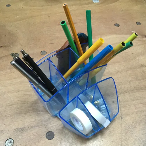 Blue plastic desk tidy