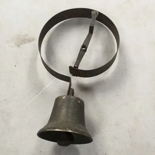 Period metal bell with wall mount