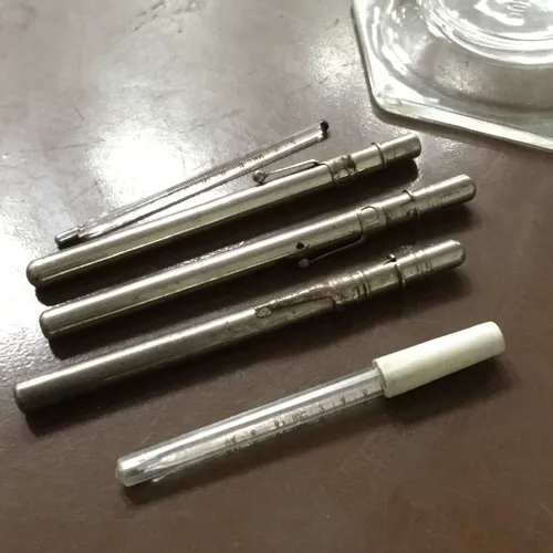 group of doctors thermometers