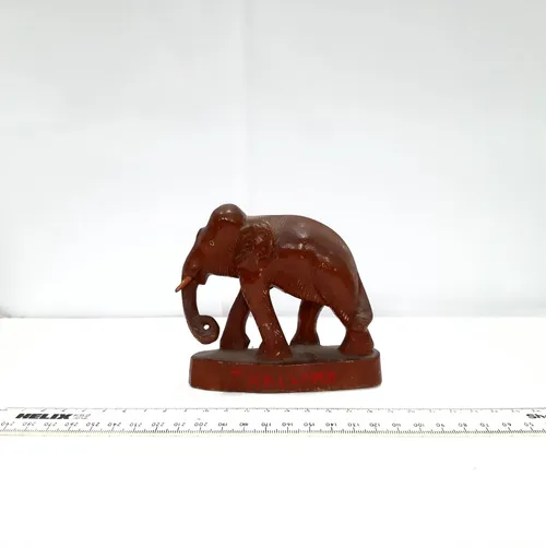 Wooden elephant on base. 'Thailand'