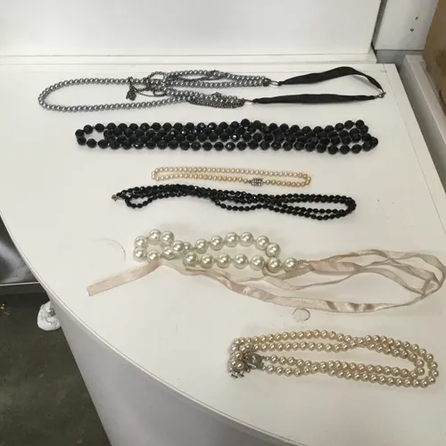 Various pearl and beaded necklaces