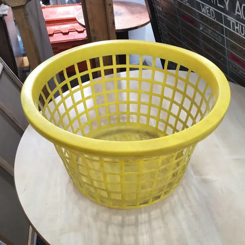Period Yellow Plastic Laundry Basket