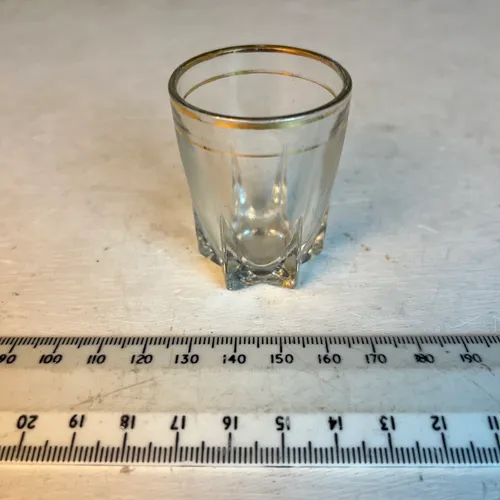 Mid-century shot glass with gold rim and band