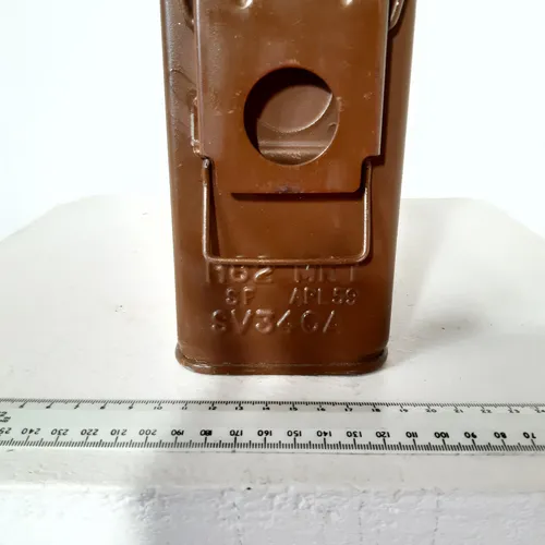 Brown ammunition box with yellow text