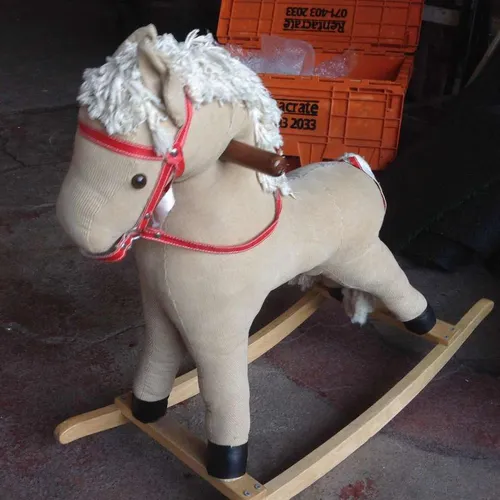 Wooden and fabric rocking horse