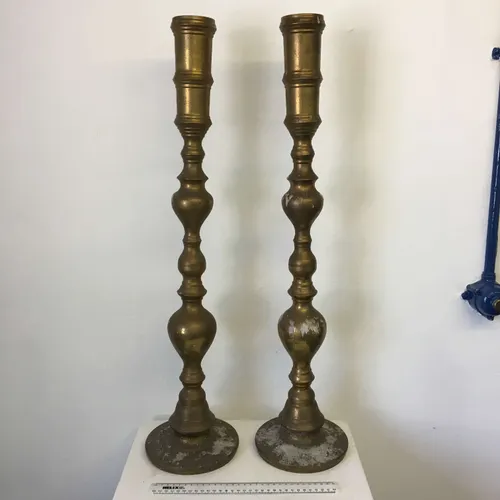 Pair of very tall brass candlesticks