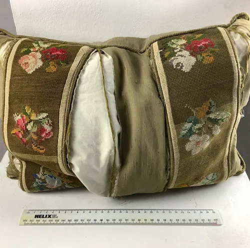 Ripped green floral pillow