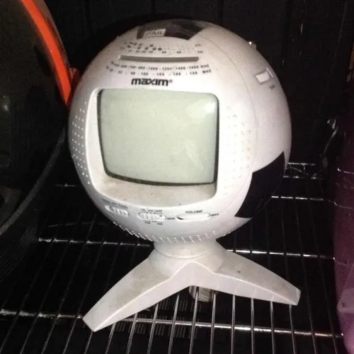 portable football Maxim television black and white