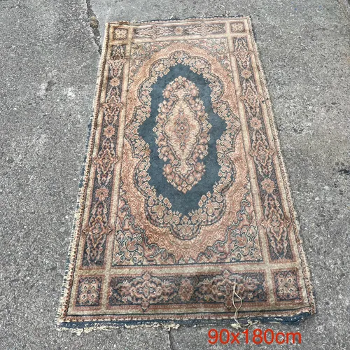 Small, Faded Rug with Brown/Beige/Blue Decoration