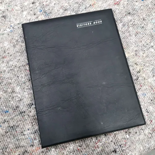 Black leather visitor book