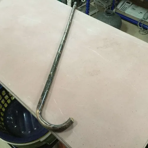 Black painted walking stick