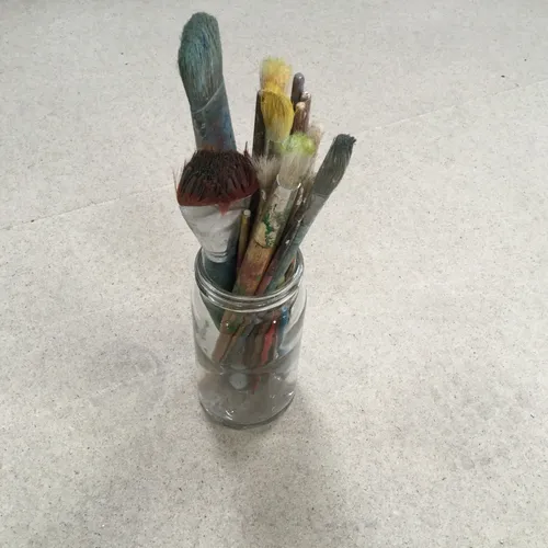 Artist Paint Brushes In Glass Jar