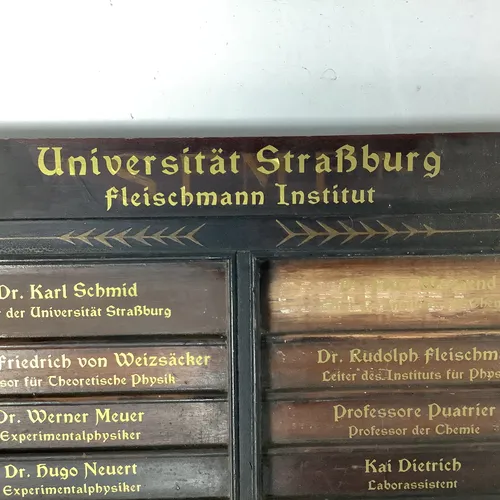 Rustic wooden “Strasburg University” signage display board