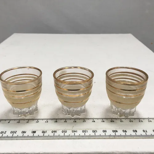 set of 3 frosted, gold banded shot glass