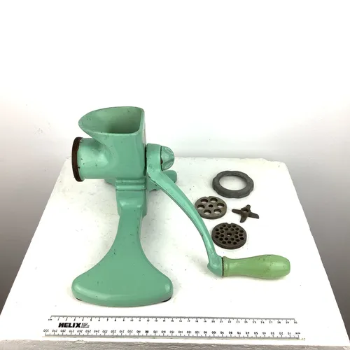 Pale Green Meat Mincer with attachments 