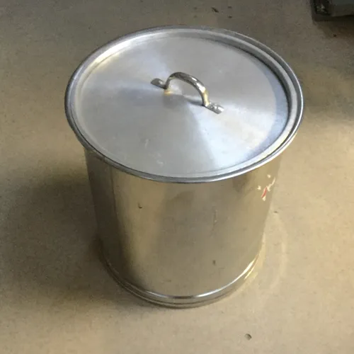 Tall metal pot with lid