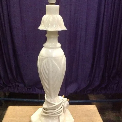 white alabaster stick lamp base with decorative design