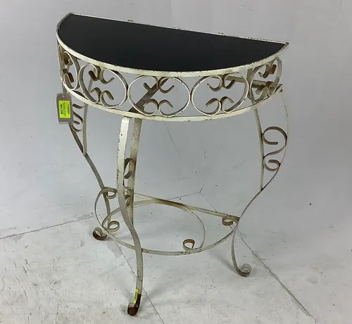 white metal half moon table with black glazed top