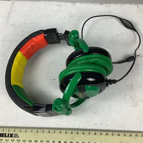 Green and Black Skull Candy Over Ear Headphones