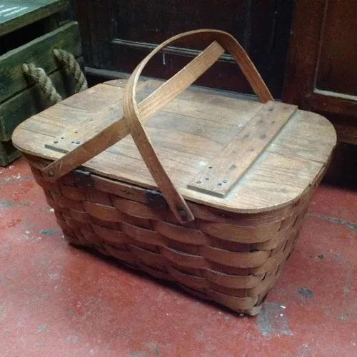 Classic wicker woven picnic basket with lid and handles