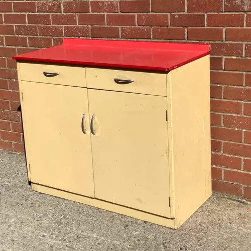 Cream Kitchen Cupboards / Unit with Red Countertop 