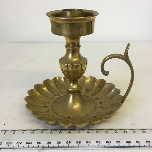 Gold/brass chamberstick with flower shaped base