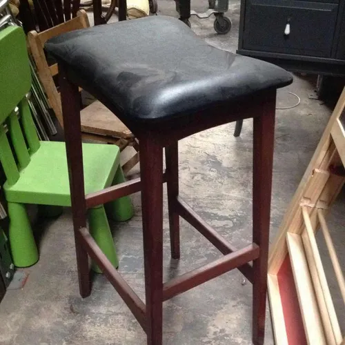 Wooden bar stool with black vinyl seat pad