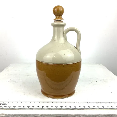 Cream and Tan Curved Stoneware Flagon with Cork Stopper