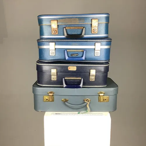 Various Blue Vintage Suitcases