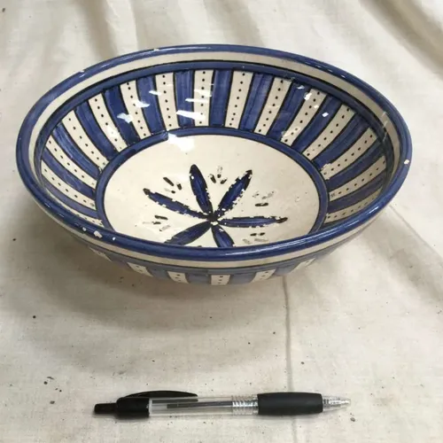 Blue and White Ceramic bowl with stripes and floral design