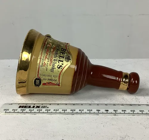 Brown and Cream Ceramic Bells Whiskey Bell Bottle
