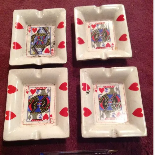 white ceramic ashtray with playing card designs