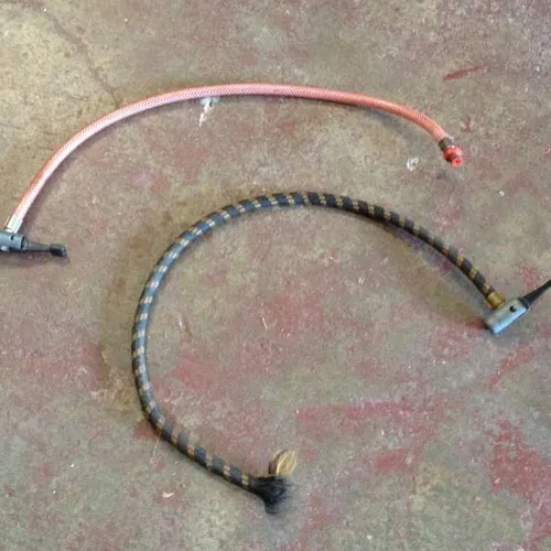 assorted / various bicycle pump hoses with nozzles