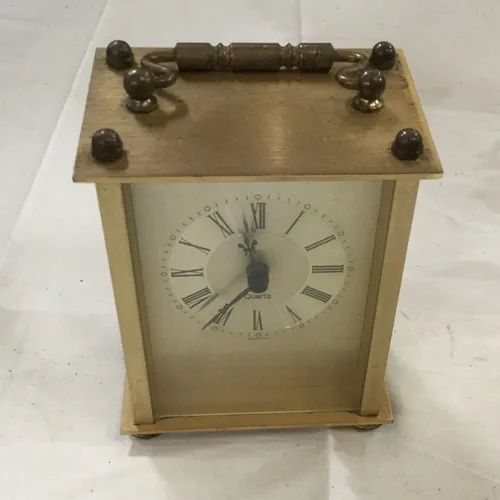 Gold carriage clock 