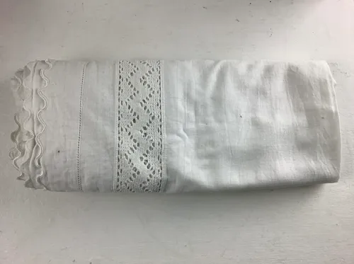 Lace edged white fabric 