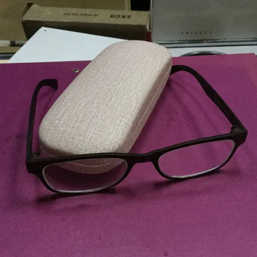 Black glasses in cream case