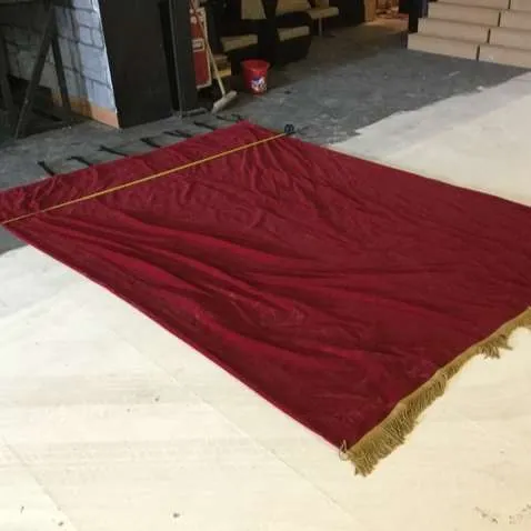 Red velvet studio curtains/drape with gold tassel edging 