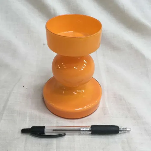 Orange glass tea light holder