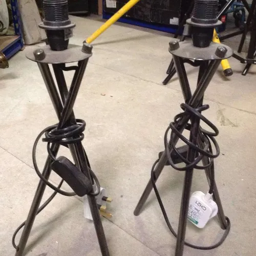 black metal tripod stick lamp base