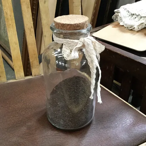 Period Glass Storage Jar with Cork Stopper and White Fabric