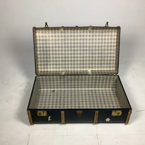 Navy and light wood trunk