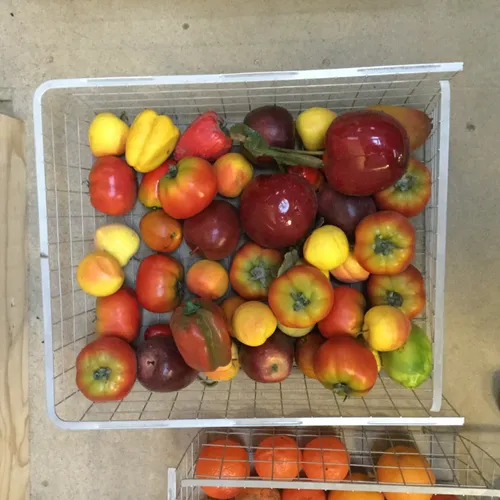 Basket of artificial fruit / veg