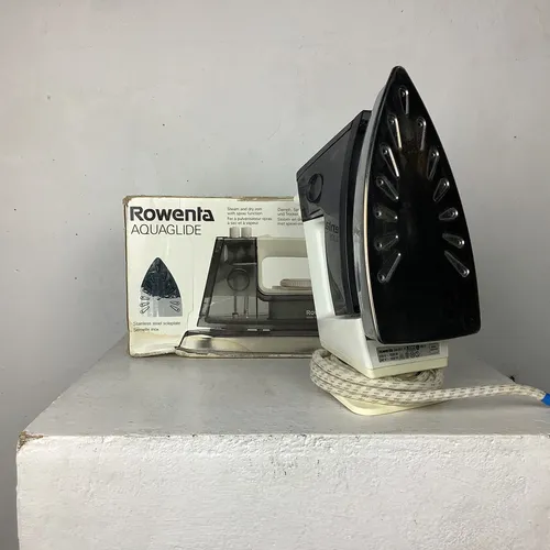 White and Black Rowenta Aquaglide Iron